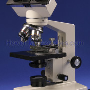 Compound light microscope for use with viewing biological specimens on slides.