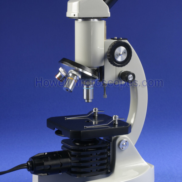 Compound light microscope for use with viewing biological specimens on slides.