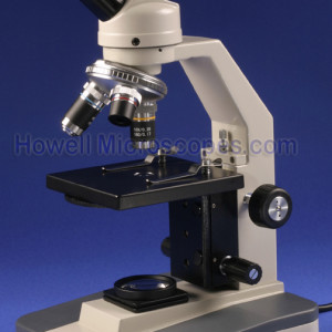 Compound light microscope for use with viewing biological specimens on slides.